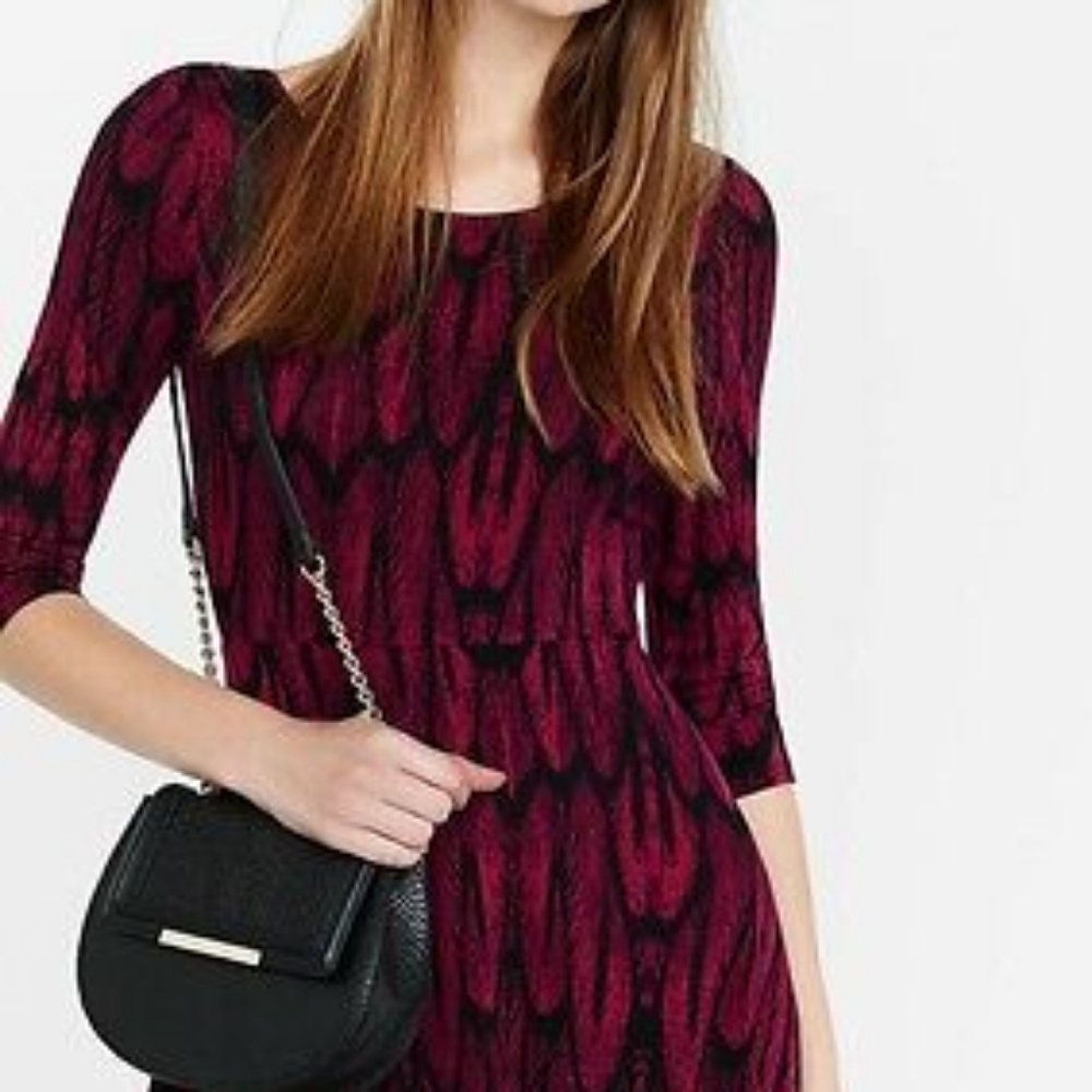 Express scoop neck, low back cut dress with red feather print
